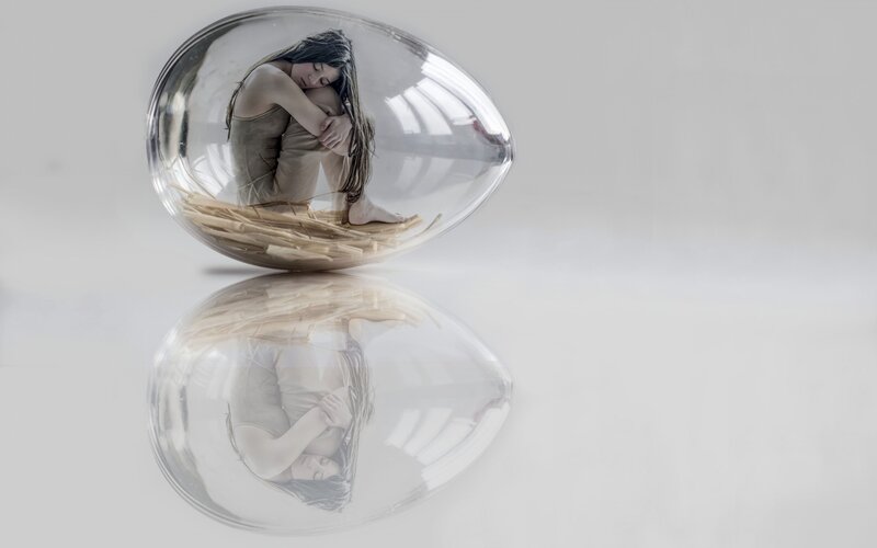 Woman in Glass Egg