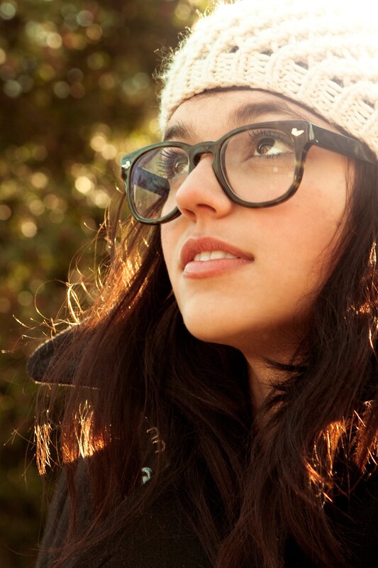 woman in glasses and beanie