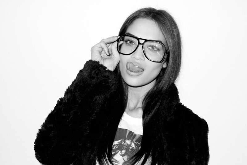 woman in glasses and fur coat