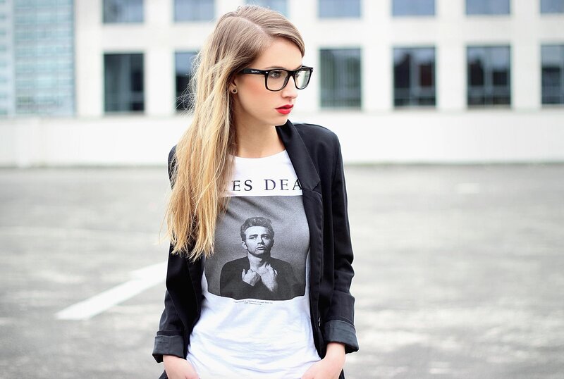 woman in glasses and graphic tee