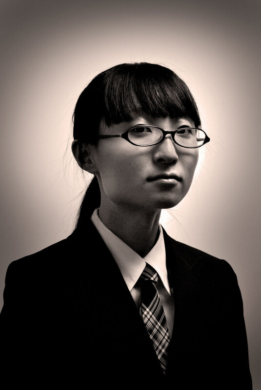 woman in glasses and suit