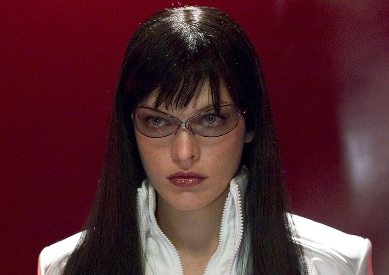 woman in glasses and white jacket