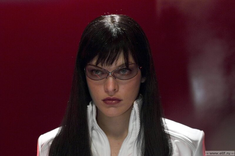 woman in glasses and white jacket