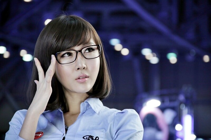 woman in glasses at event