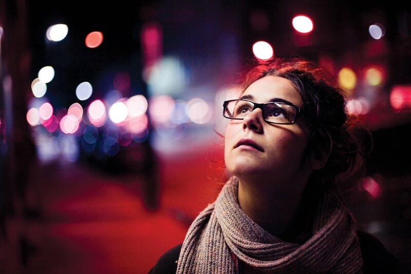 woman in glasses at night