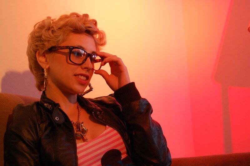 woman in glasses on couch