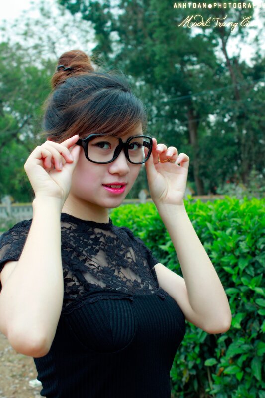 Woman in glasses outdoors