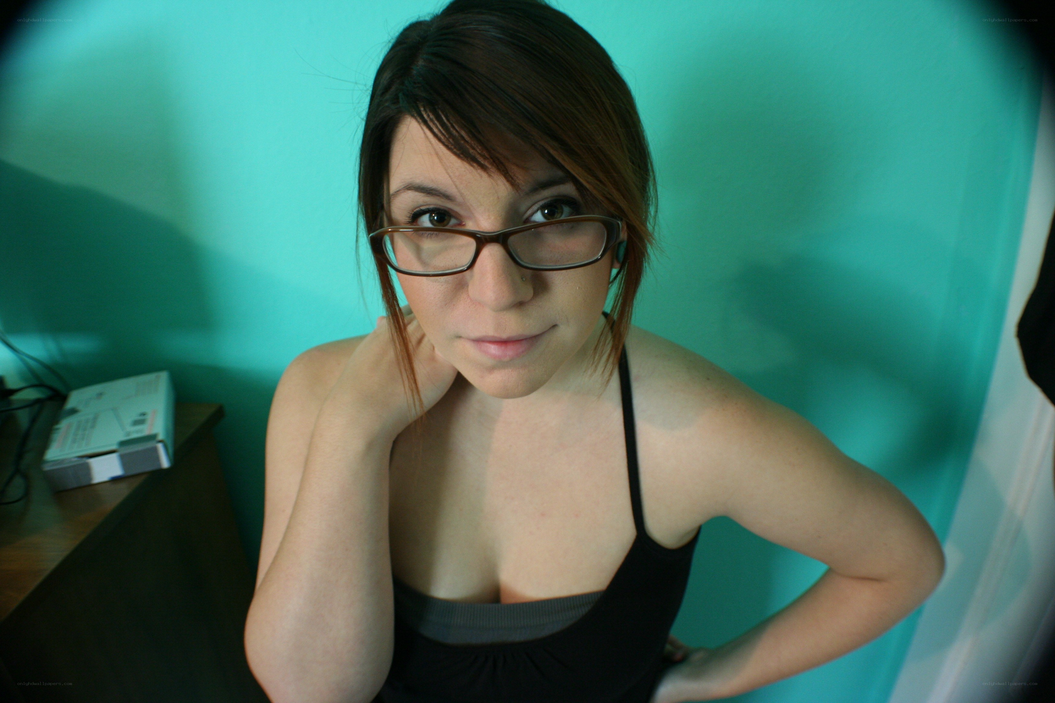 woman in glasses posing
