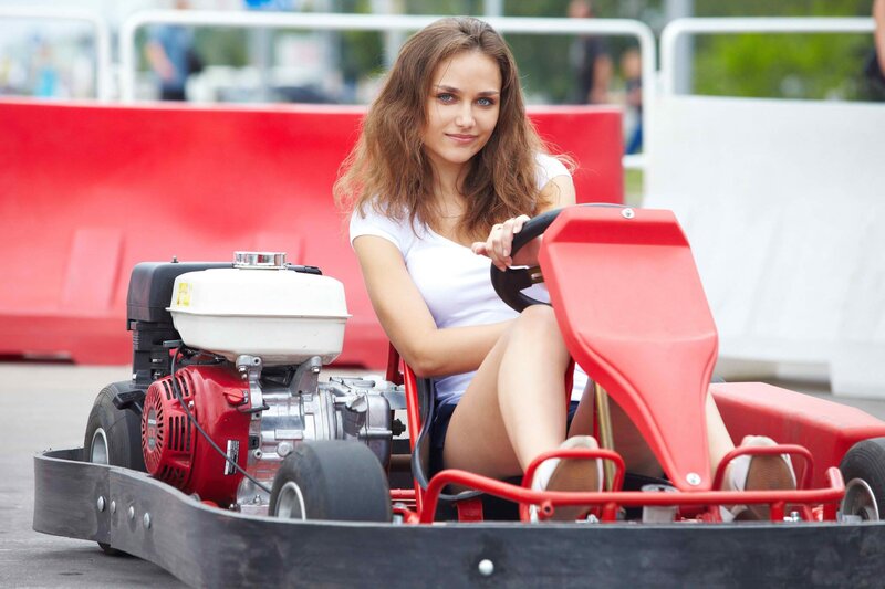 Woman in go-kart at track