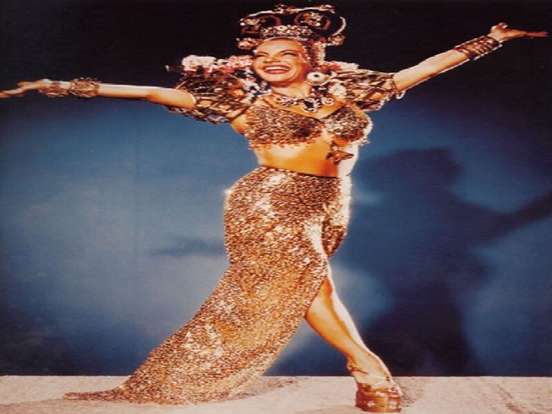 Woman in Gold Costume — Dramatic, Photograph