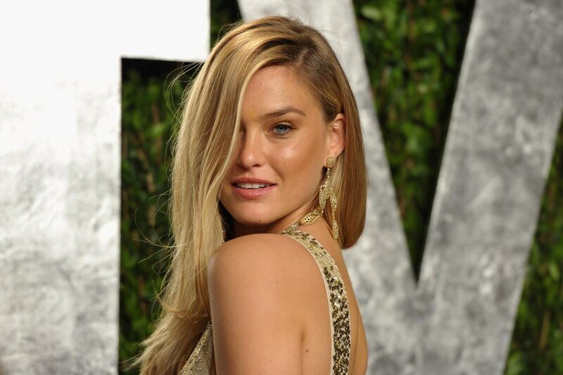 woman in gold dress at event
