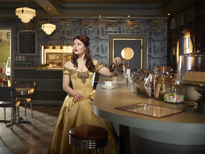 Woman in Gold Dress — Dramatic, Photograph, Coffee Shop