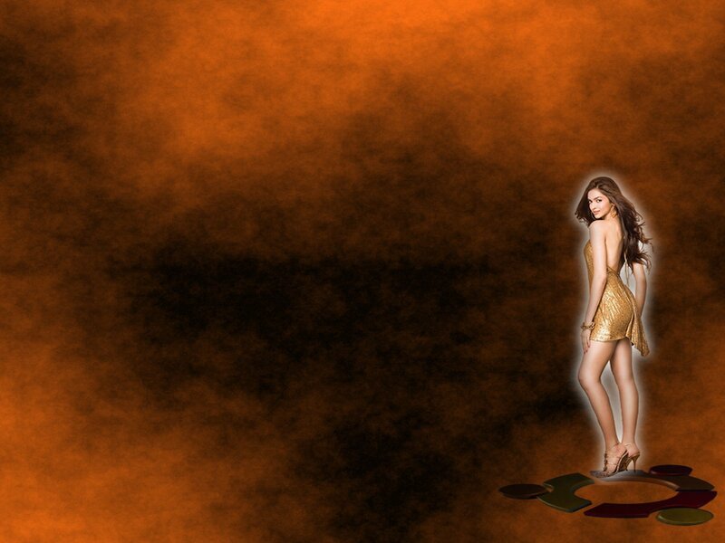 woman in gold dress on orange background