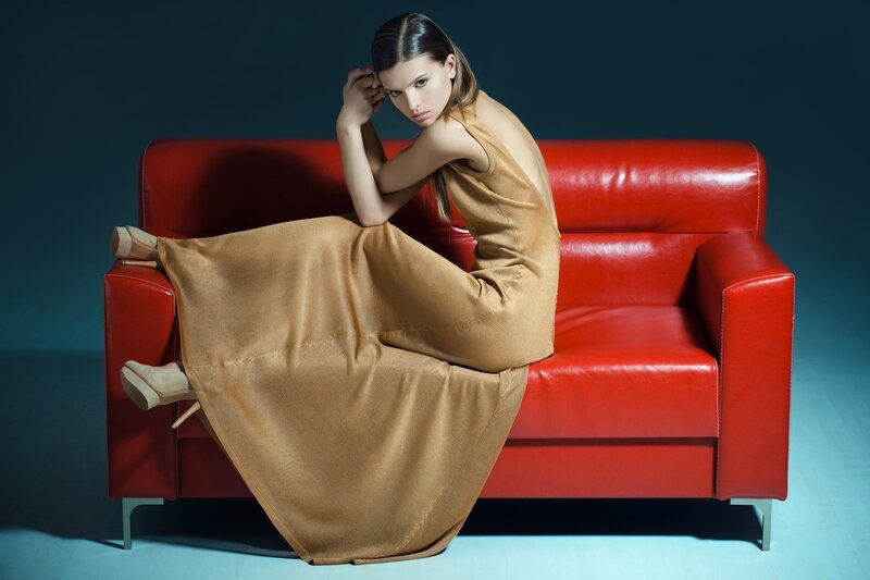 Woman in Gold Dress — Red, Dramatic, Photograph, Red Couch