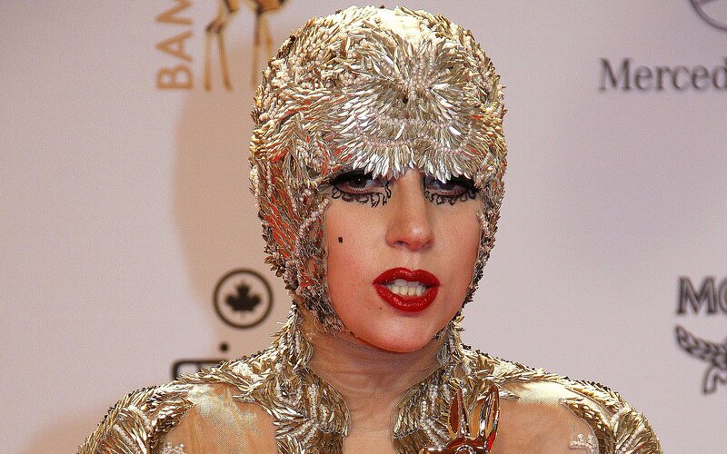 Woman in Gold Headpiece — Dramatic