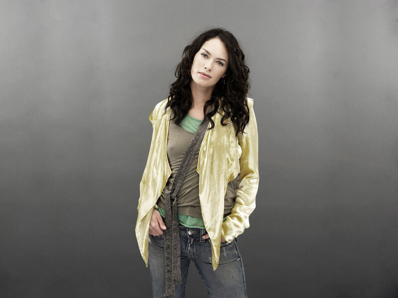 woman in gold jacket