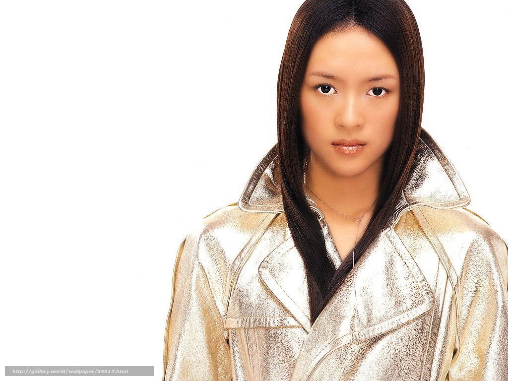 woman in gold jacket