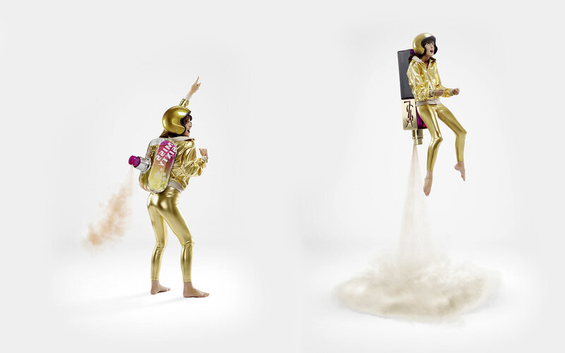 woman in gold jetpack suit