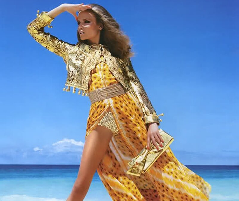 Woman in Gold Outfit — Blue