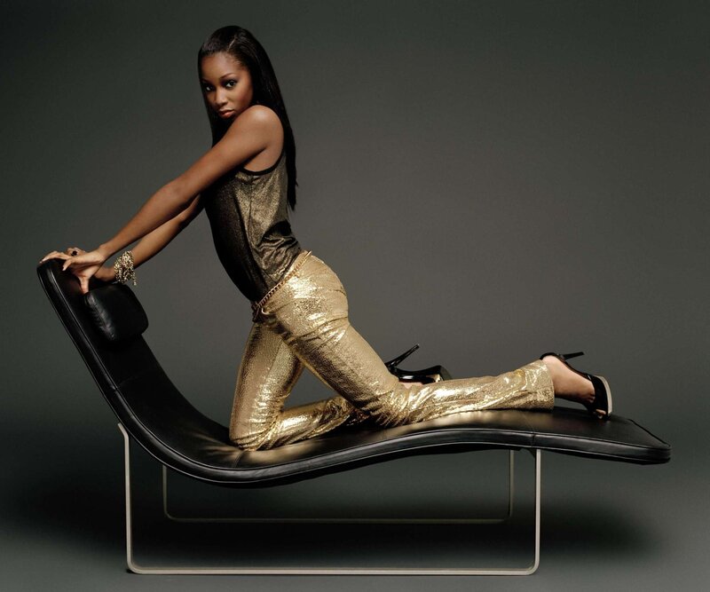 Woman in Gold Pants — Confident