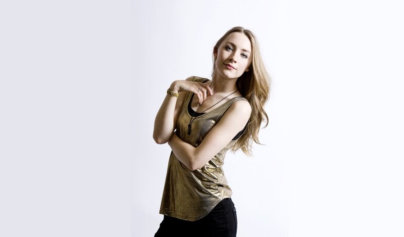 woman in gold top