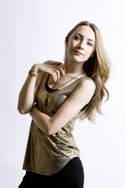 woman in gold top