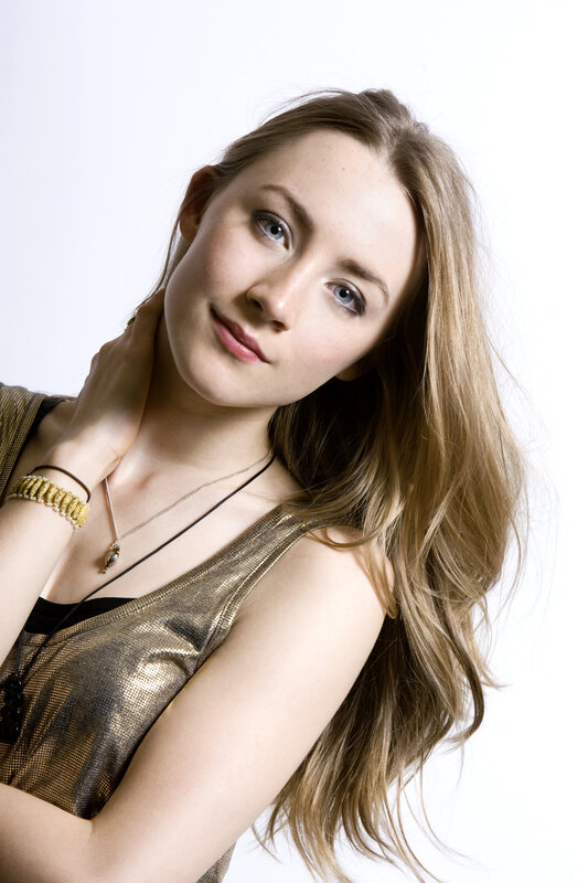 woman in gold top