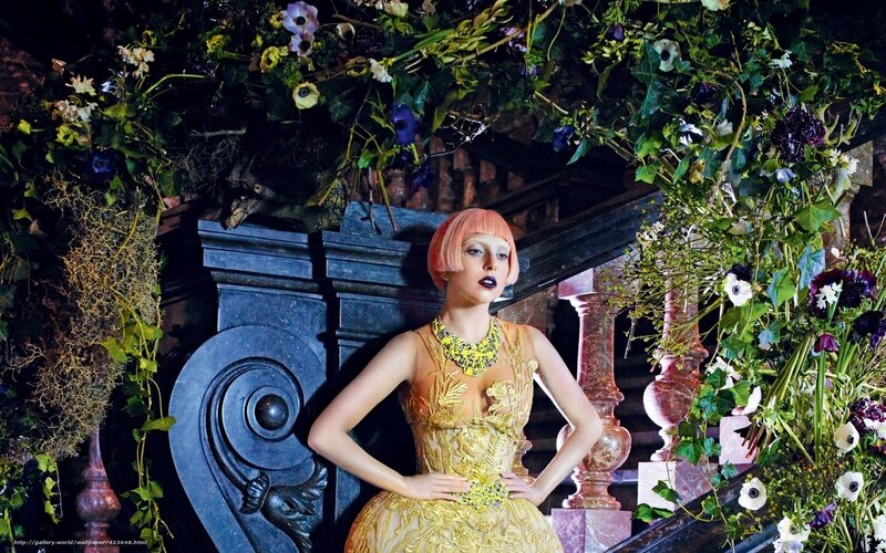 woman in golden dress with flowers