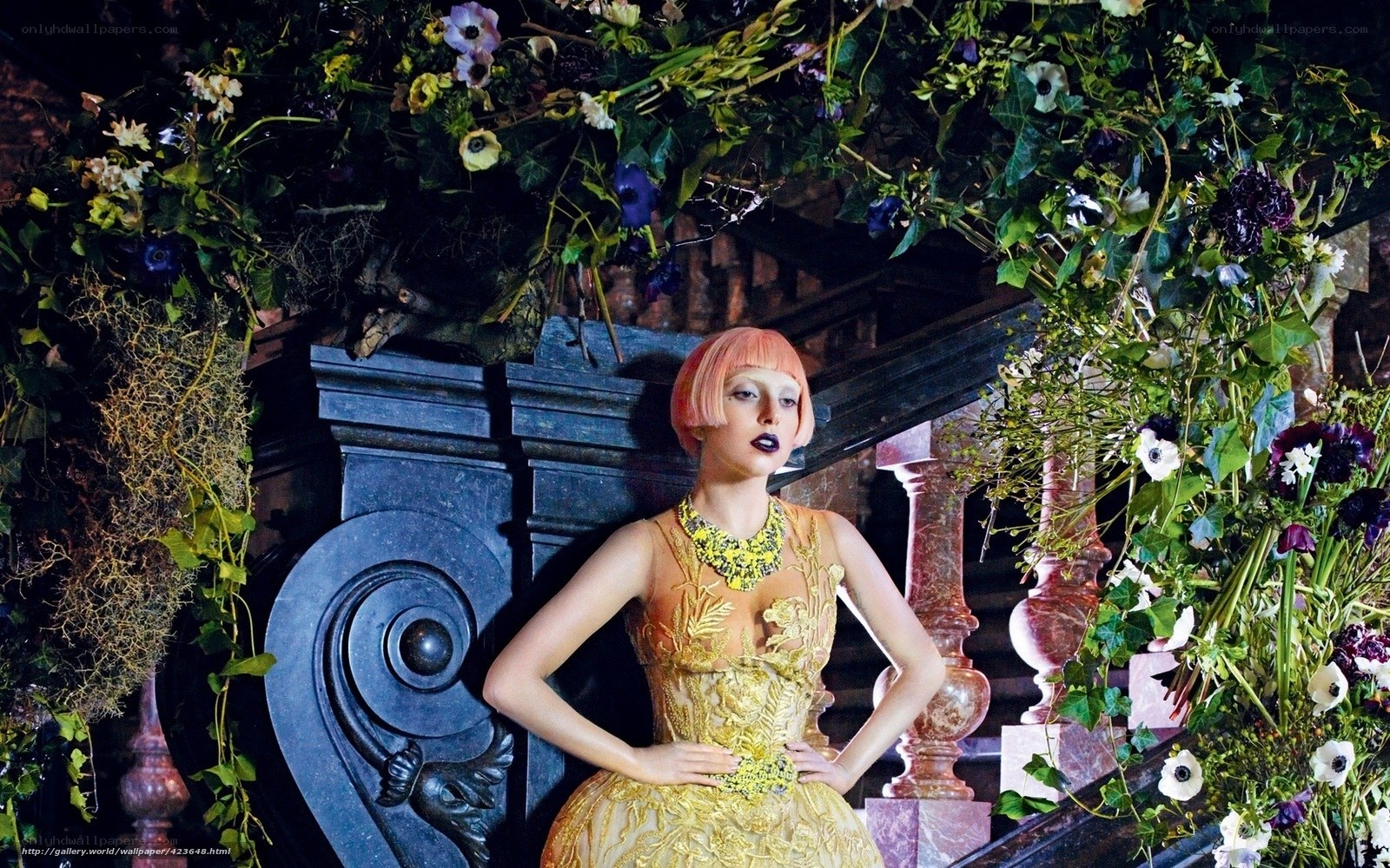 woman in golden dress with flowers