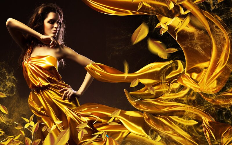 woman in golden dress with leaves