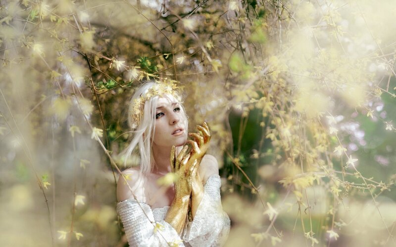 woman in golden forest
