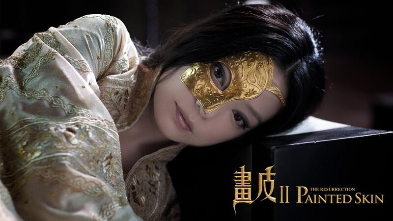 woman in golden mask
