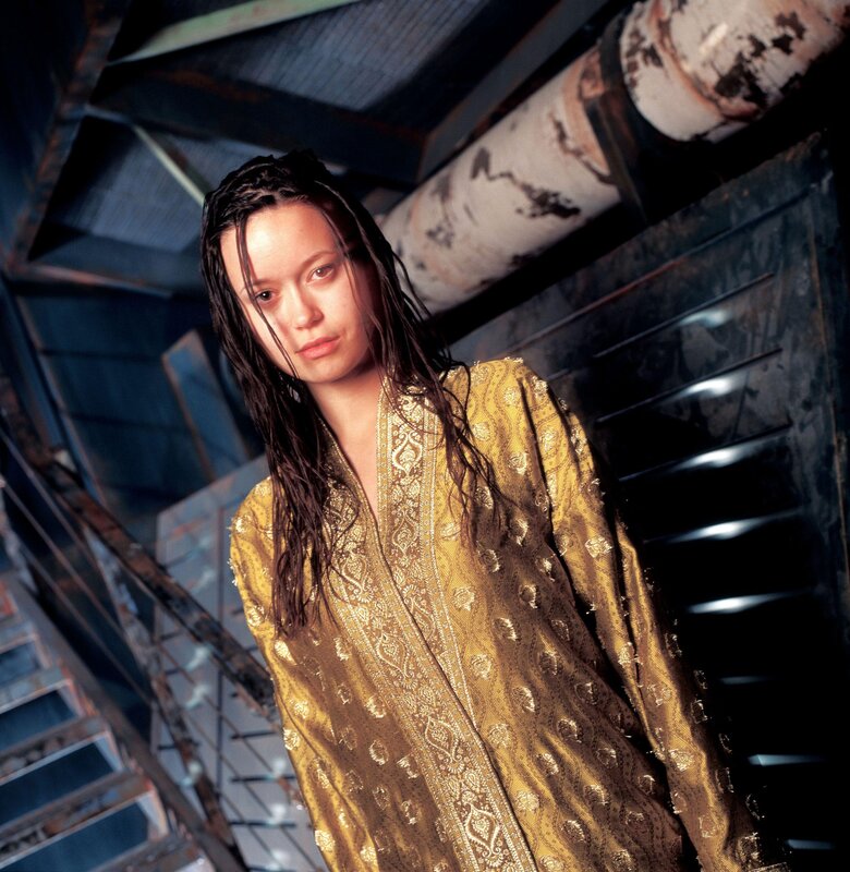 woman in golden robe