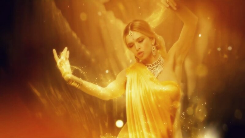 Woman in Golden Sari — Gold
