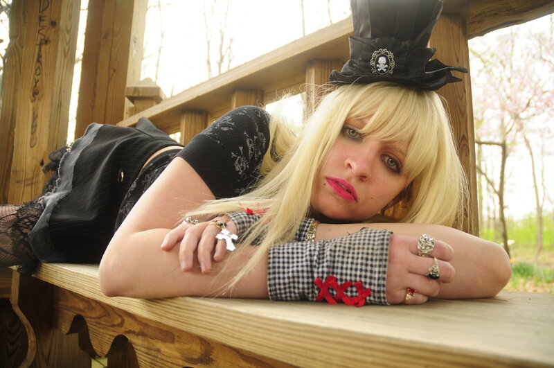 woman in goth attire on deck