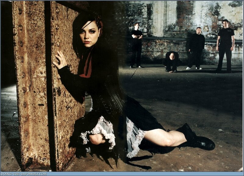 woman in gothic attire with band