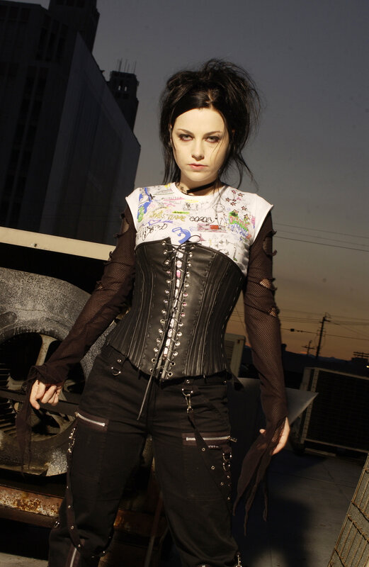 woman in gothic outfit on rooftop