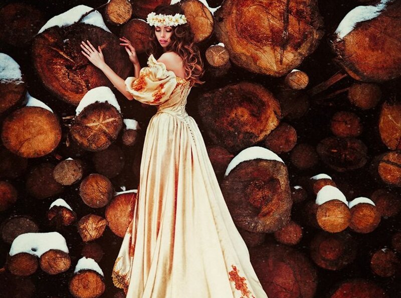 Woman in Gown Among Logs