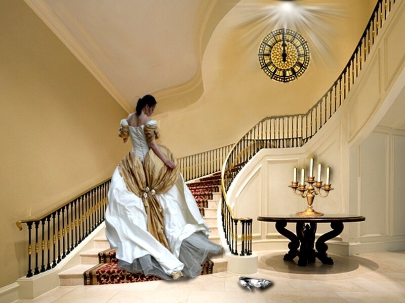 Woman in gown on grand staircase