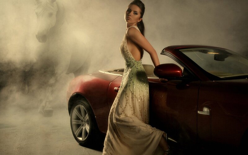 woman in gown with car