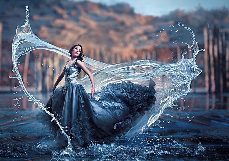 woman in gown with water splash