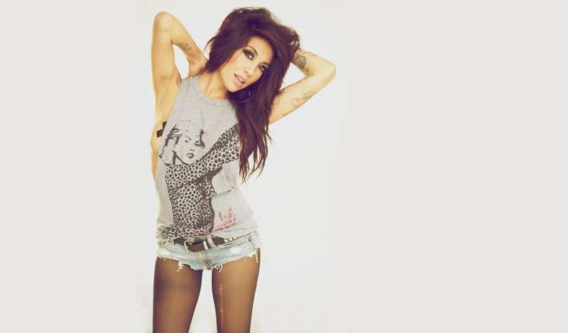 woman in graphic tee and shorts