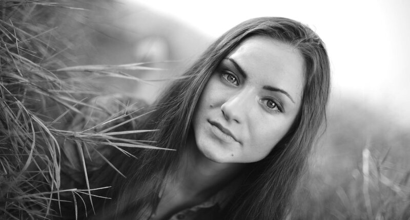woman in grass field