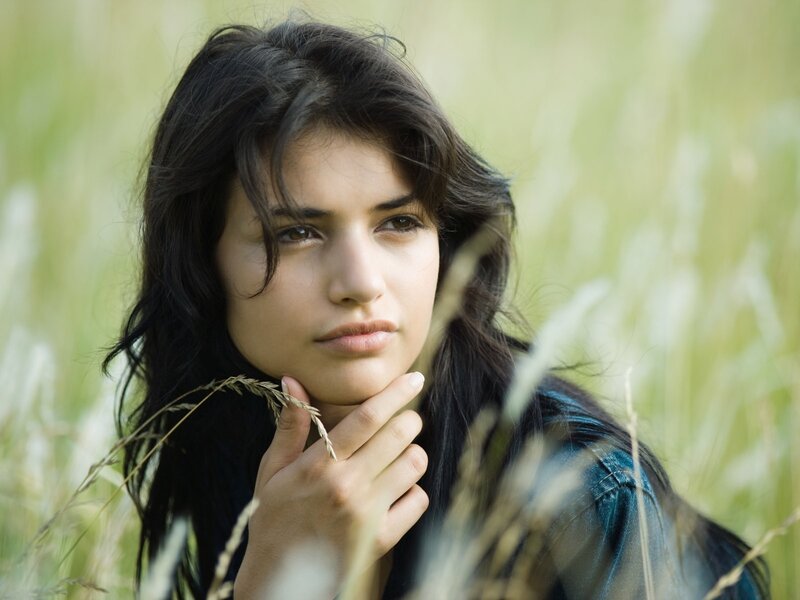 Woman in Grass Field — Green, Contemplative