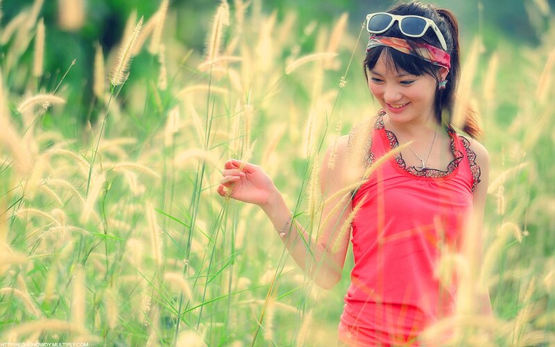Woman in Grass Field — Pink