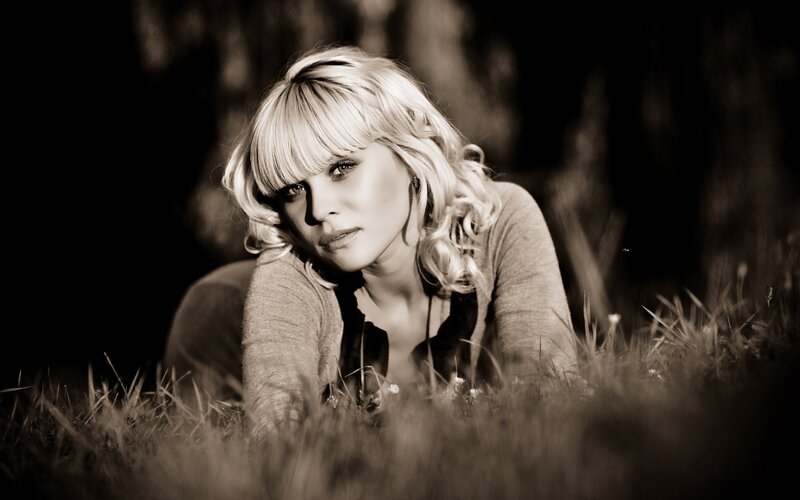 woman in grassy field