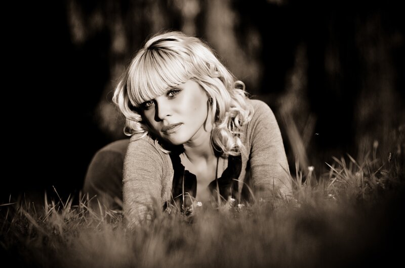 woman in grassy field