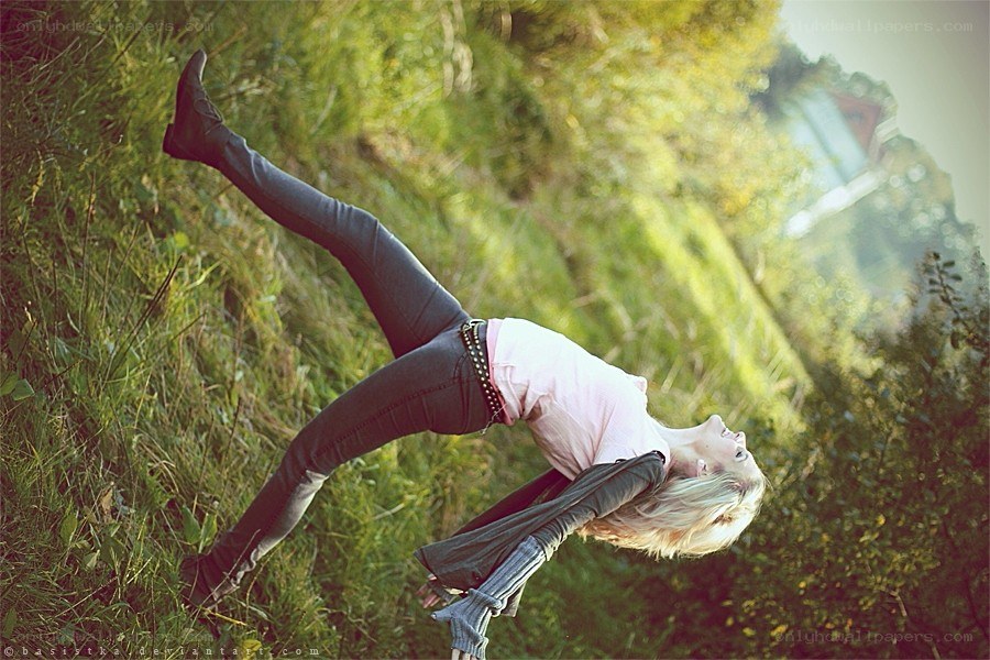 woman in grassy field