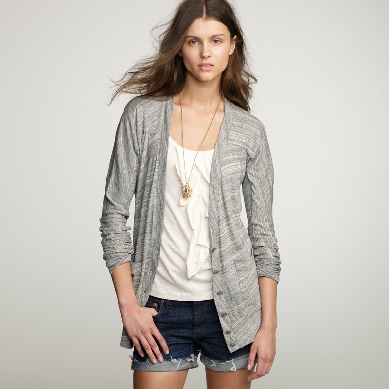 woman in gray cardigan
