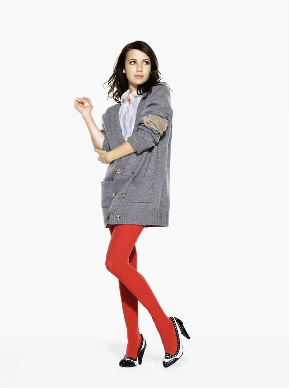 woman in gray cardigan and red tights
